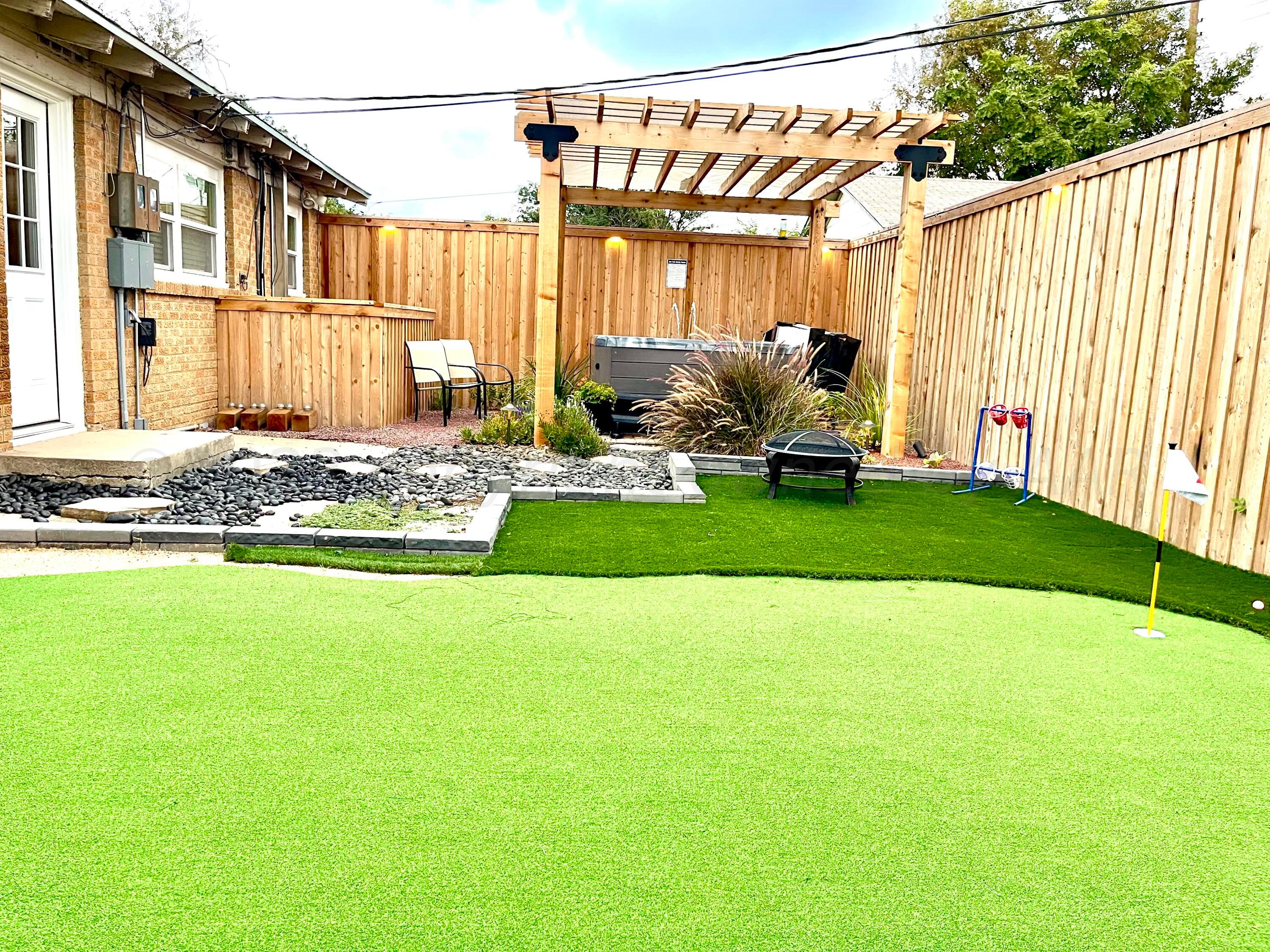 3501 Moss Lane Amarillo, TX 79109 - Photo 10 of 51 a view of a backyard with table and chairs and wooden fence