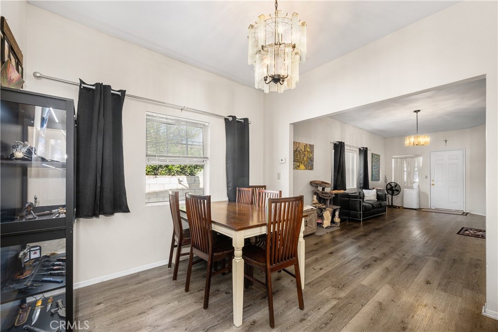 9722 Walnut Street Bellflower, CA 90706 - Photo 11 of 55 a view of a dining room with furniture window and outside view