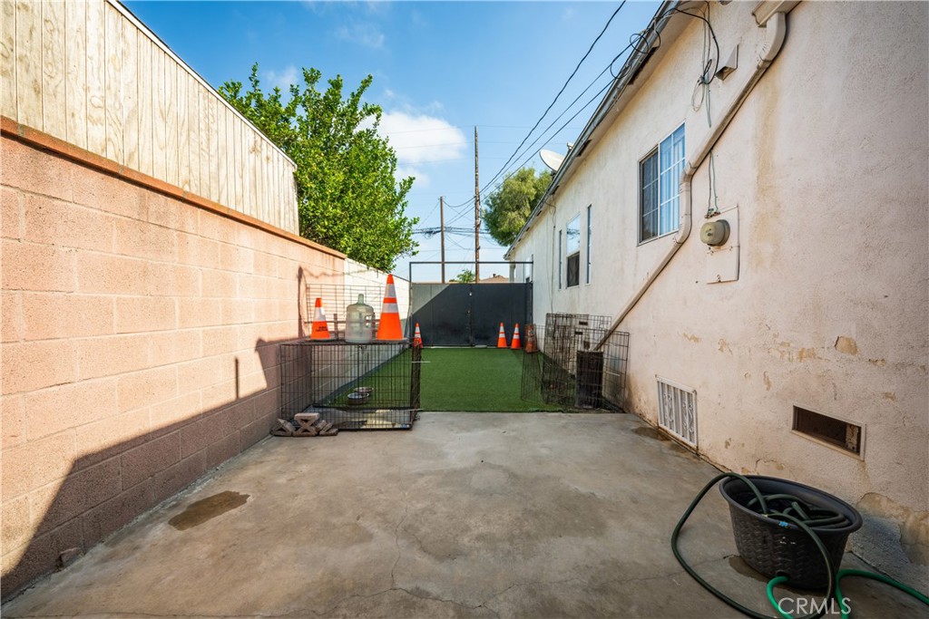 9722 Walnut Street Bellflower, CA 90706 - Photo 51 of 55 a view of an outdoor space with porch