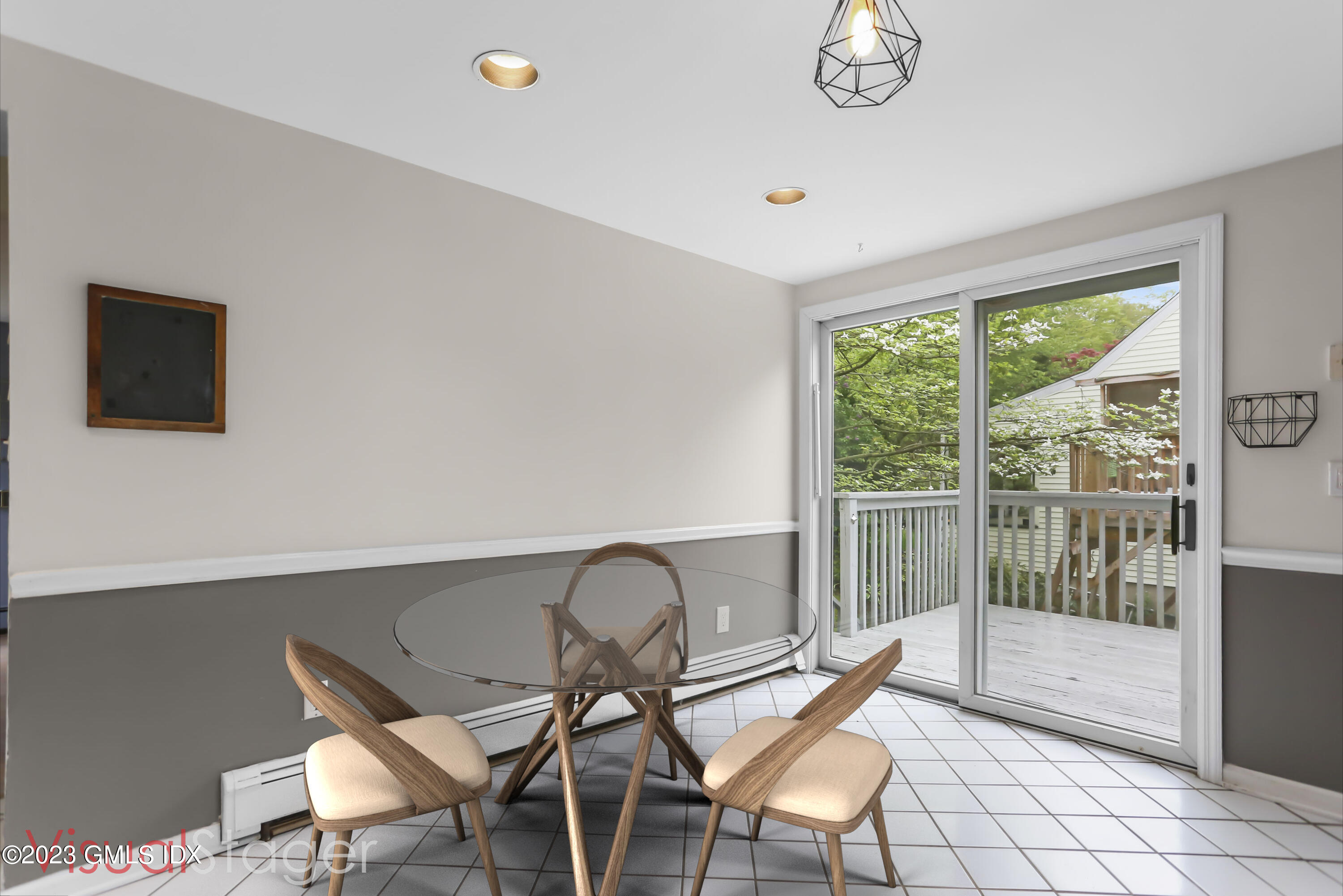 16 Pemberwick Road Greenwich, CT 06831 - Photo 5 of 32 a dining room with furniture and a floor to ceiling window