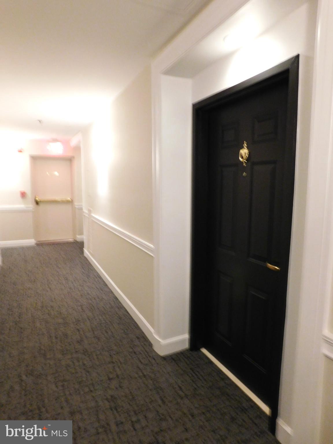 1855 Stratford Park Place, Unit 103 Reston, VA 20190 - Photo 5 of 49 Great access to side exit for walking the dog.
