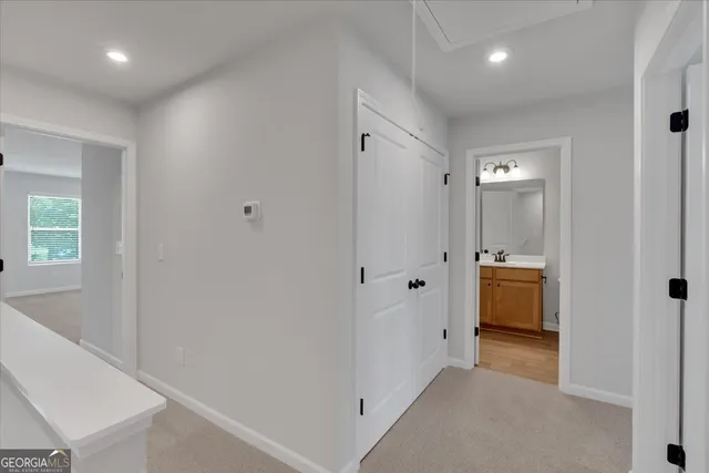 a view of a bathroom with a tub and shower