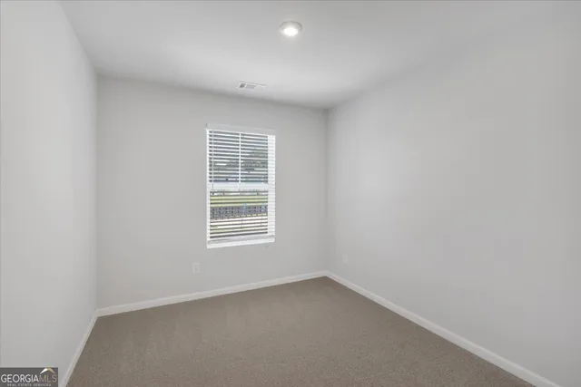 an empty room with a window