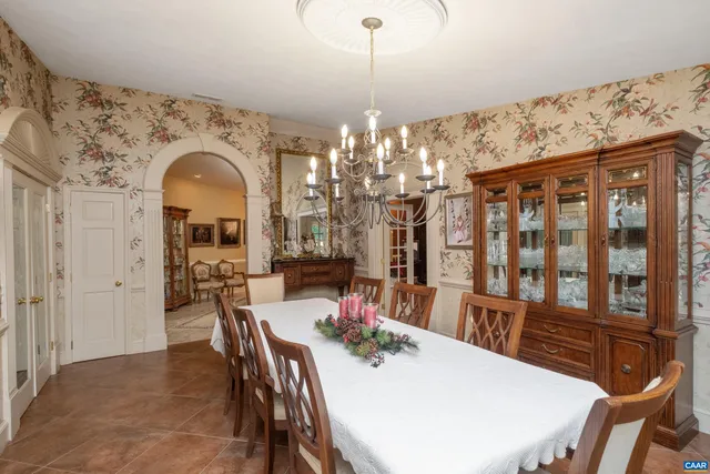 a bathroom with a bathtub a toilet and a shower