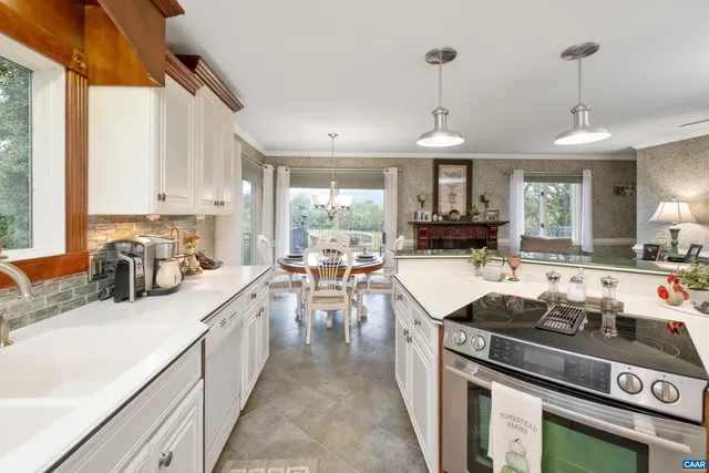 a bathroom with a sink vanity granite and a mirror