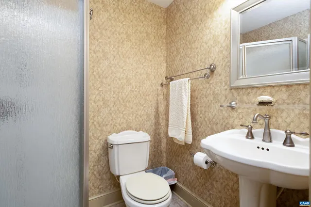 a kitchen with stainless steel appliances granite countertop a stove and a refrigerator