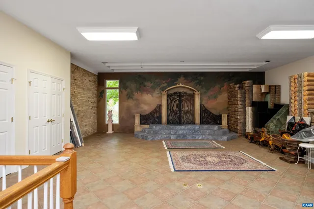 a view of a garden with large trees