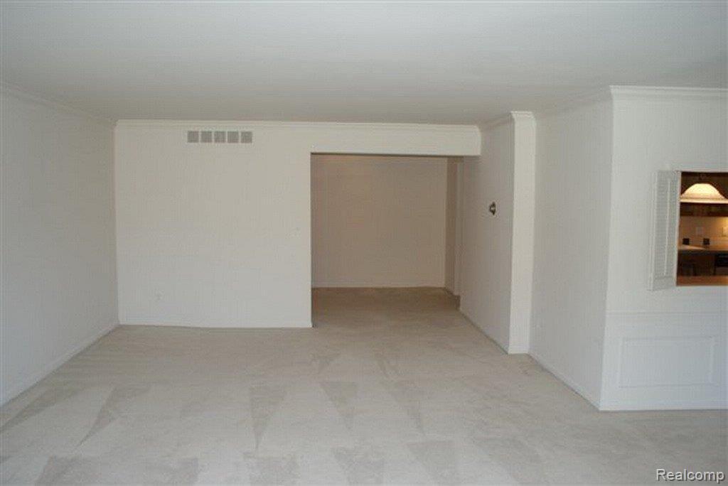 18301 West Thirteen Mile Road, Unit 3 Southfield, MI 48076 - Photo 6 of 23 Living Room Open To Foyer & DR
