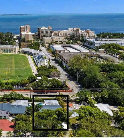a view of a city with an ocean view