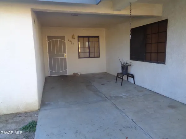 a view of livingroom with furniture and windows