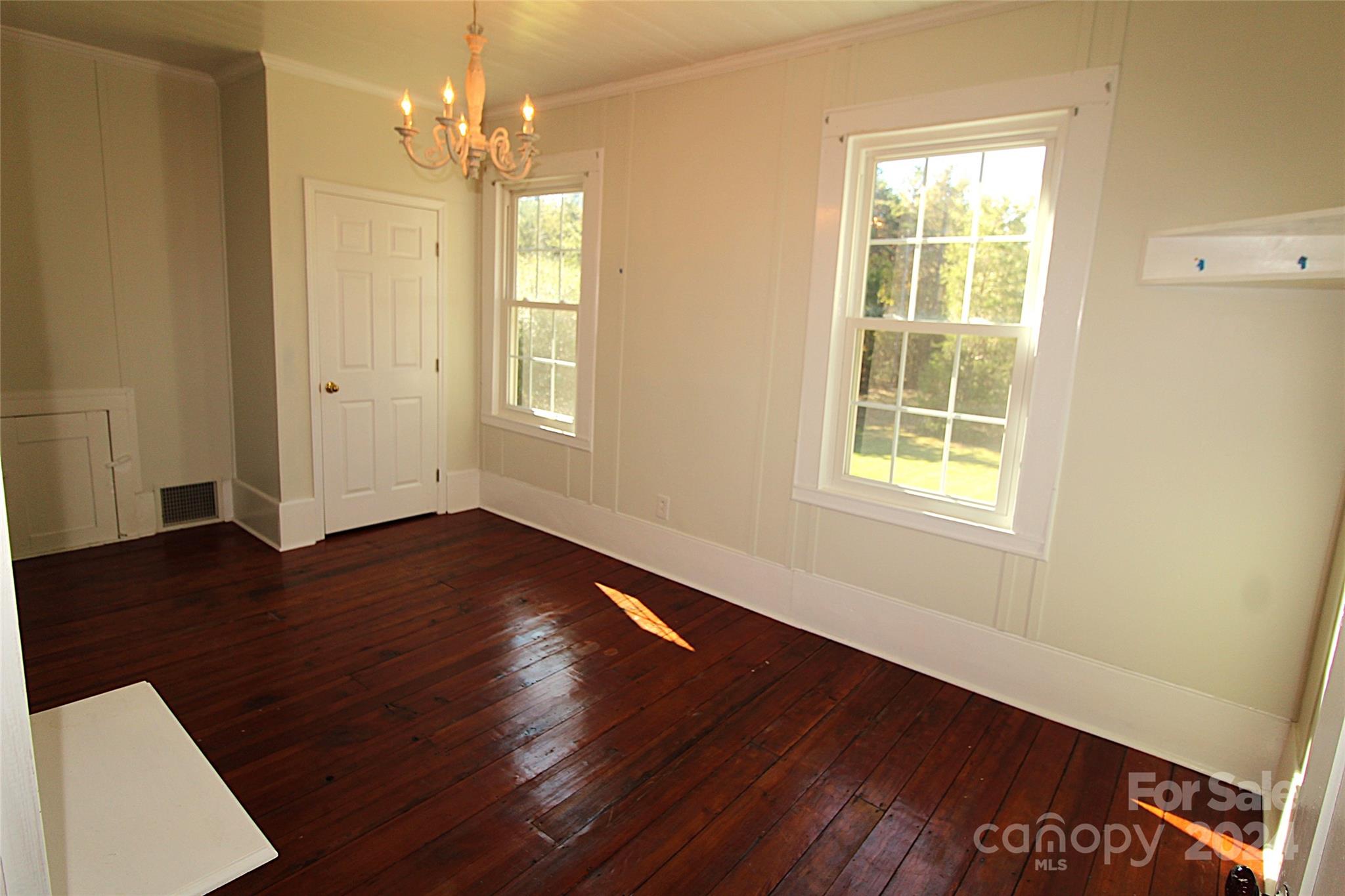 2002 Edge Park Road Clover, SC 29710 - Photo 19 of 25 an empty room with wooden floor and windows