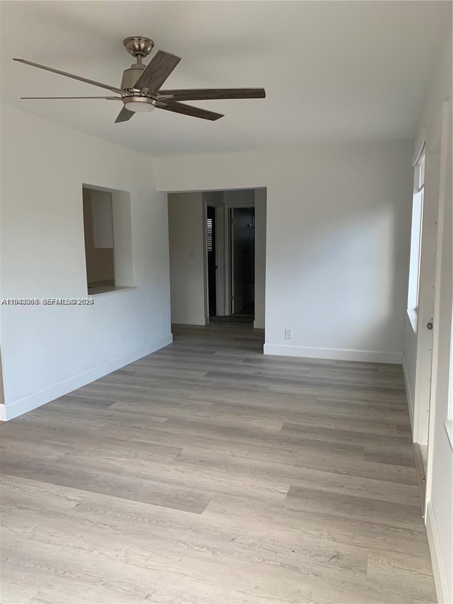 227 Southeast 7th Street Dania Beach, FL 33004 - Photo 10 of 13 a view of a hallway with a window