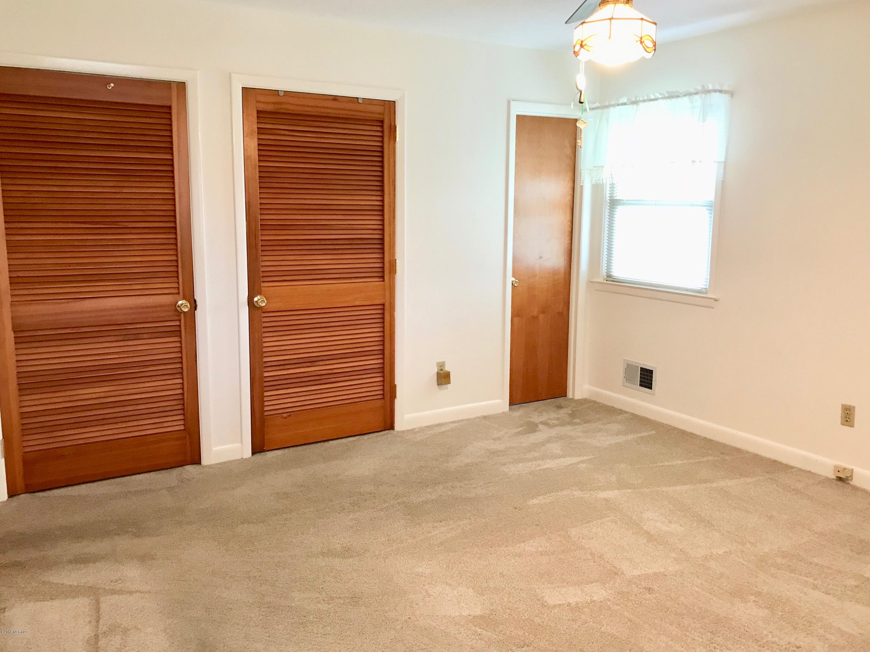 1074 Fertilizer Road Riegelwood, NC 28456 - Photo 25 of 35 2 closets, ceiling fan and private bath.