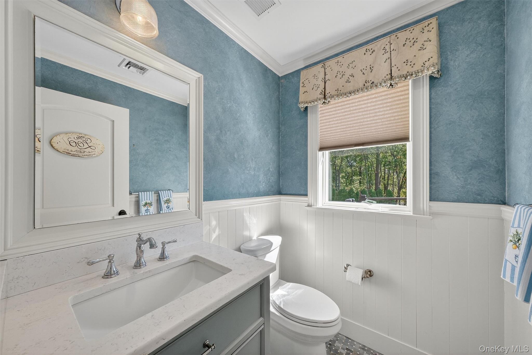 5 Stonehaven Road West Nyack, NY 10994 - Photo 16 of 50 a bathroom with a sink vanity mirror and toilet