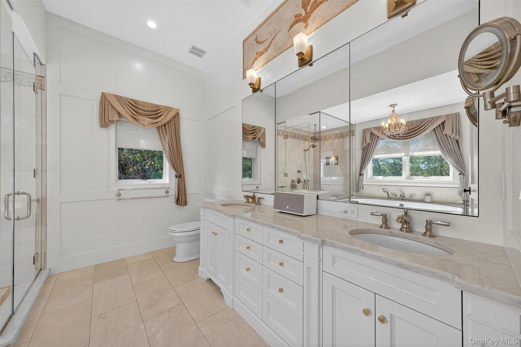 5 Stonehaven Road West Nyack, NY 10994 - Photo 19 of 50 a bathroom with a double vanity sink mirror and bathtub