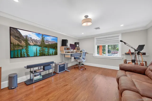 a outdoor living space with furniture and large window