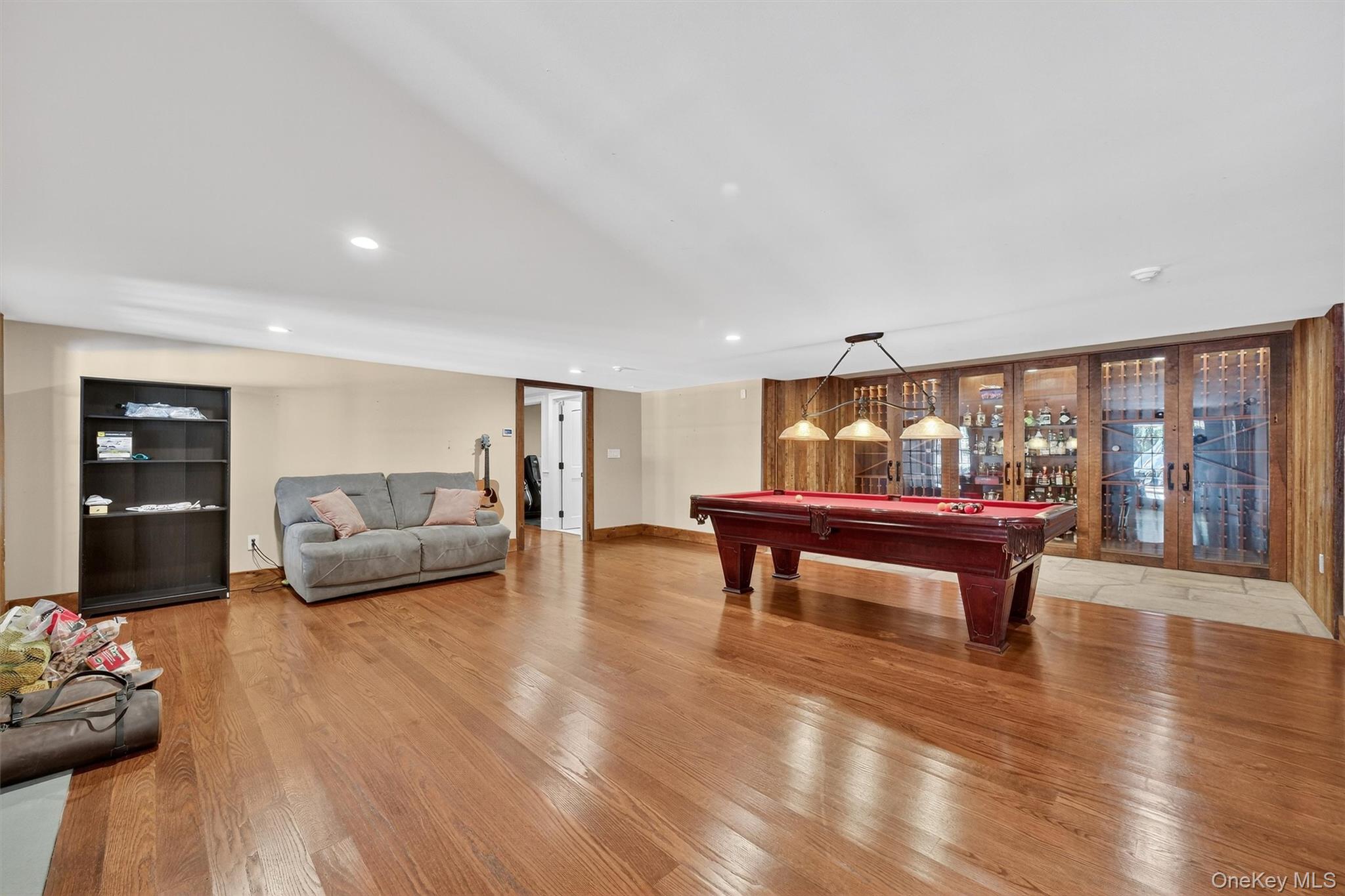 5 Stonehaven Road West Nyack, NY 10994 - Photo 34 of 50 Lower level Recreation room with billiards, light wood-type flooring, and recessed lighting