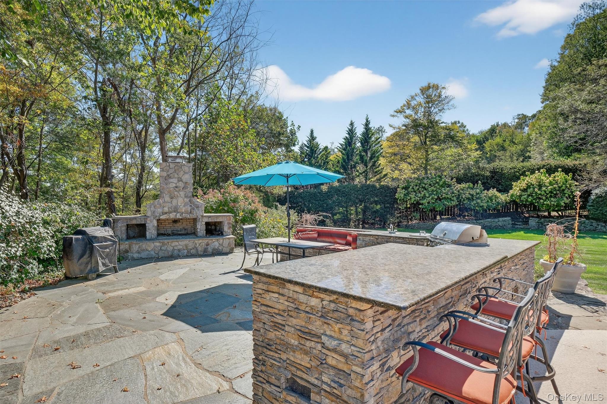 5 Stonehaven Road West Nyack, NY 10994 - Photo 41 of 50 a view of a backyard with sitting area and furniture