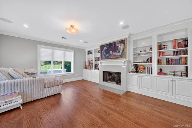 a kitchen with stainless steel appliances granite countertop a stove a sink island and a wooden cabinets