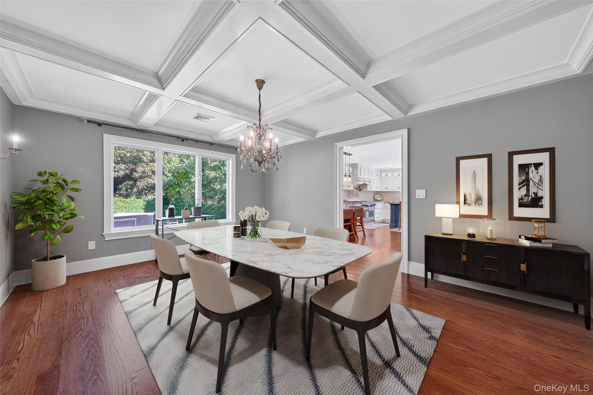 5 Stonehaven Road West Nyack, NY 10994 - Photo 10 of 50 Dining space featuring beamed ceiling, coffered ceiling, a chandelier, and crown molding