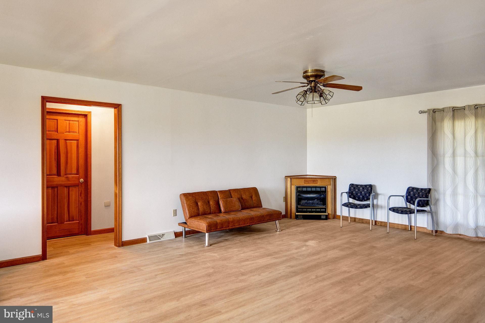 120 Richards Road Bridgeton, NJ 08302 - Photo 16 of 48 Living Room Area with Corner Fire Place