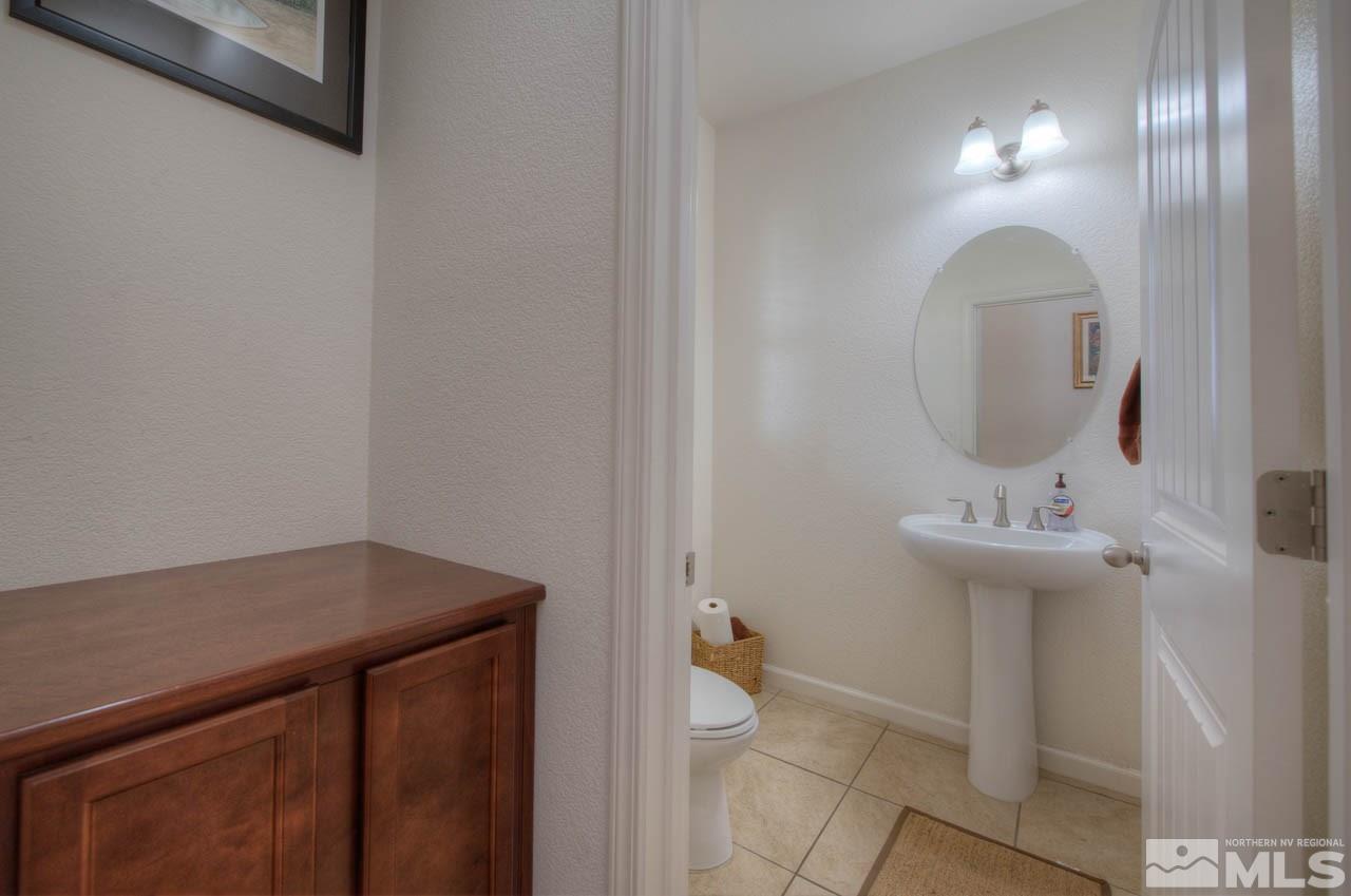 2180 Hope Valley Drive Reno, NV 89521 - Photo 15 of 21 a bathroom with a sink and a mirror