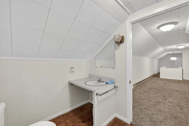 a view of a hallway with workspace