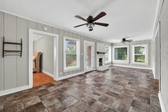 a view of livingroom with hardwood floor and a ceiling fan