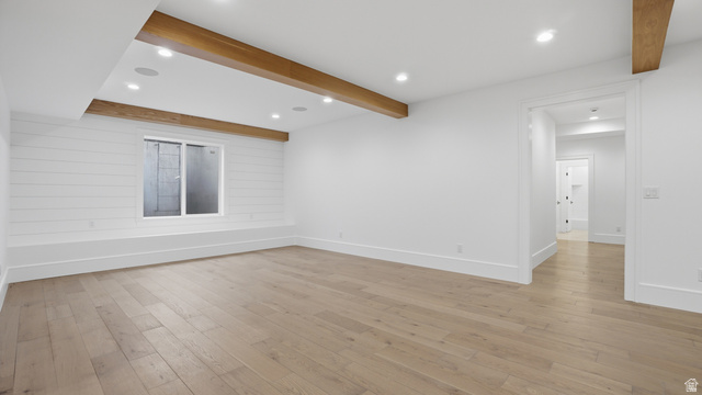 1682 North 1950 W Street, Unit 9 Provo, UT 84604 - Photo 45 of 84 Spacious room featuring wood-finish flooring, recessed lighting, and exposed ceiling beams