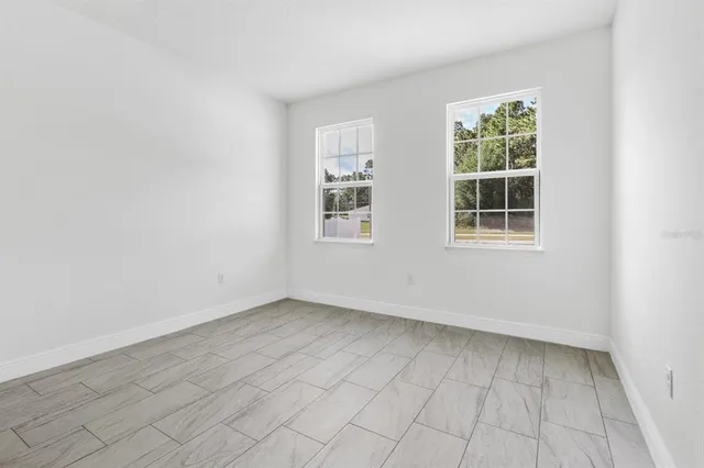 a bathroom with a bathtub and sink