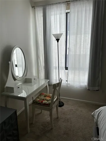 a room with furniture and a window