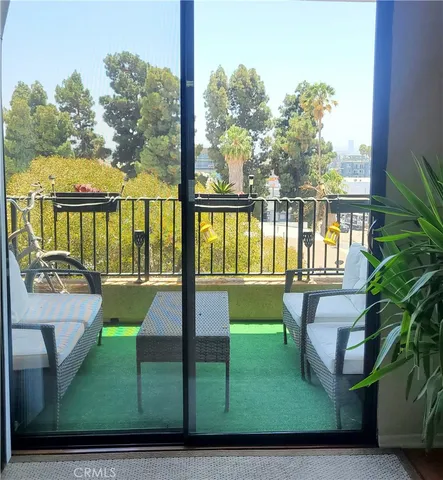 a view of swimming pool from a balcony