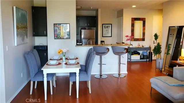 a view of kitchen dining table and chairs