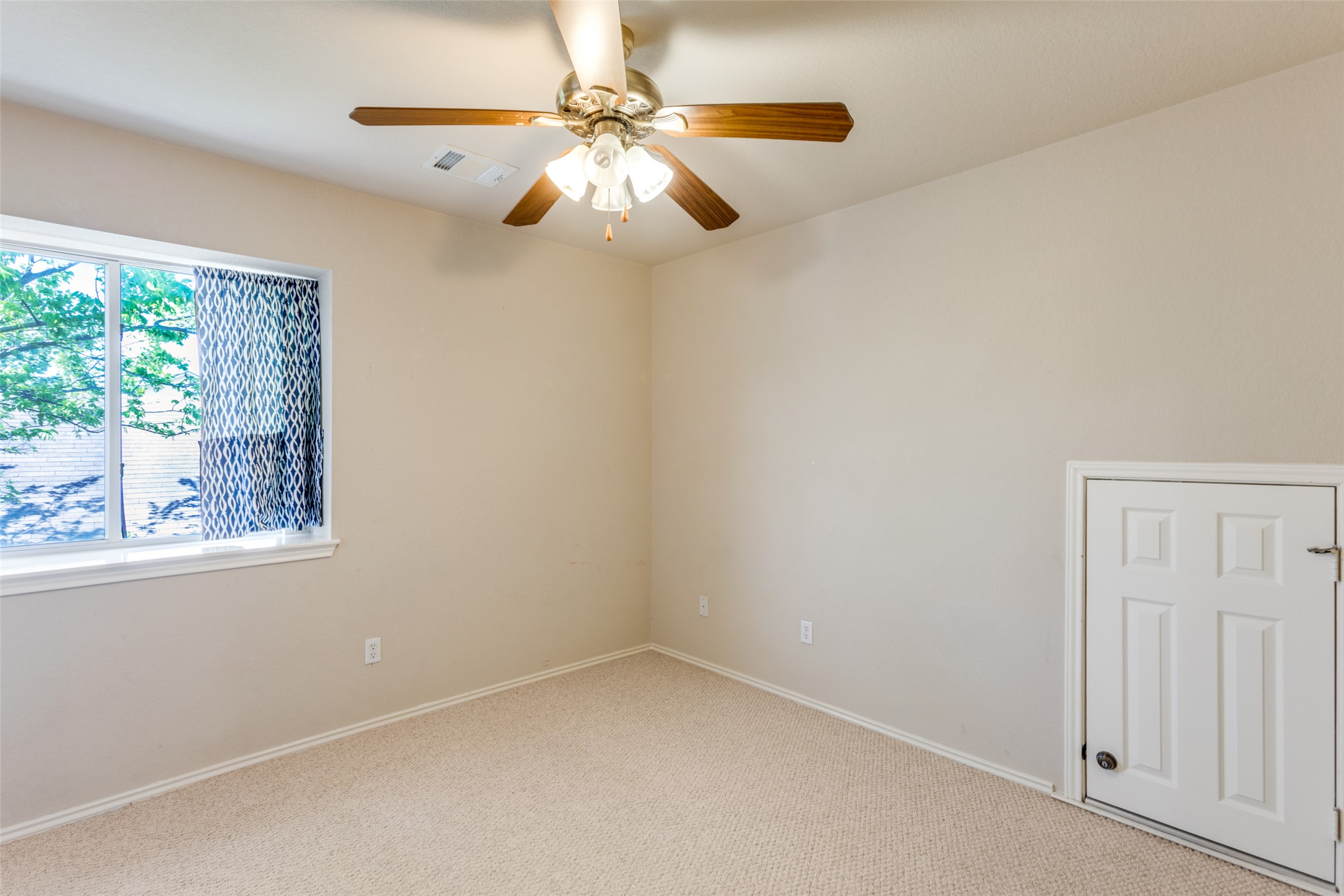 5043 Hartson Kyle, TX 78640 - Photo 20 of 30 Third bedroom with a ceiling fan and carpet
