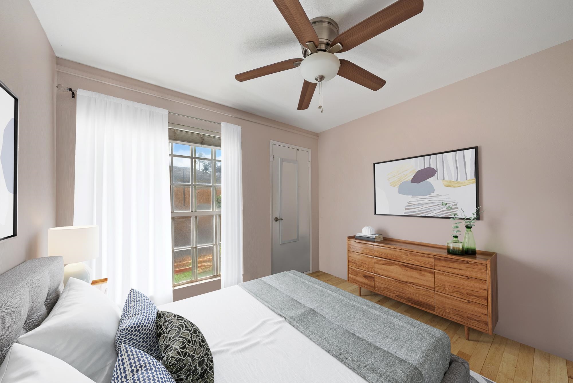 160 Keonekai Road, Unit 9101 Kihei, HI 96753 - Photo 11 of 23 a bedroom with a large bed and a chandelier