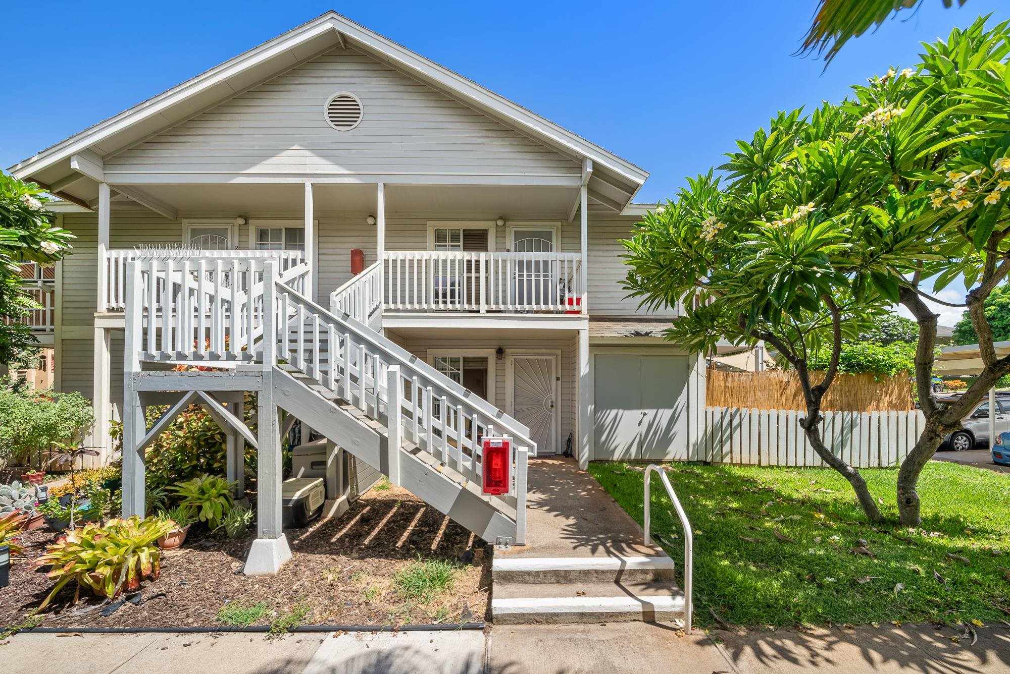 160 Keonekai Road, Unit 9101 Kihei, HI 96753 - Photo 21 of 23 a front view of a house with garden