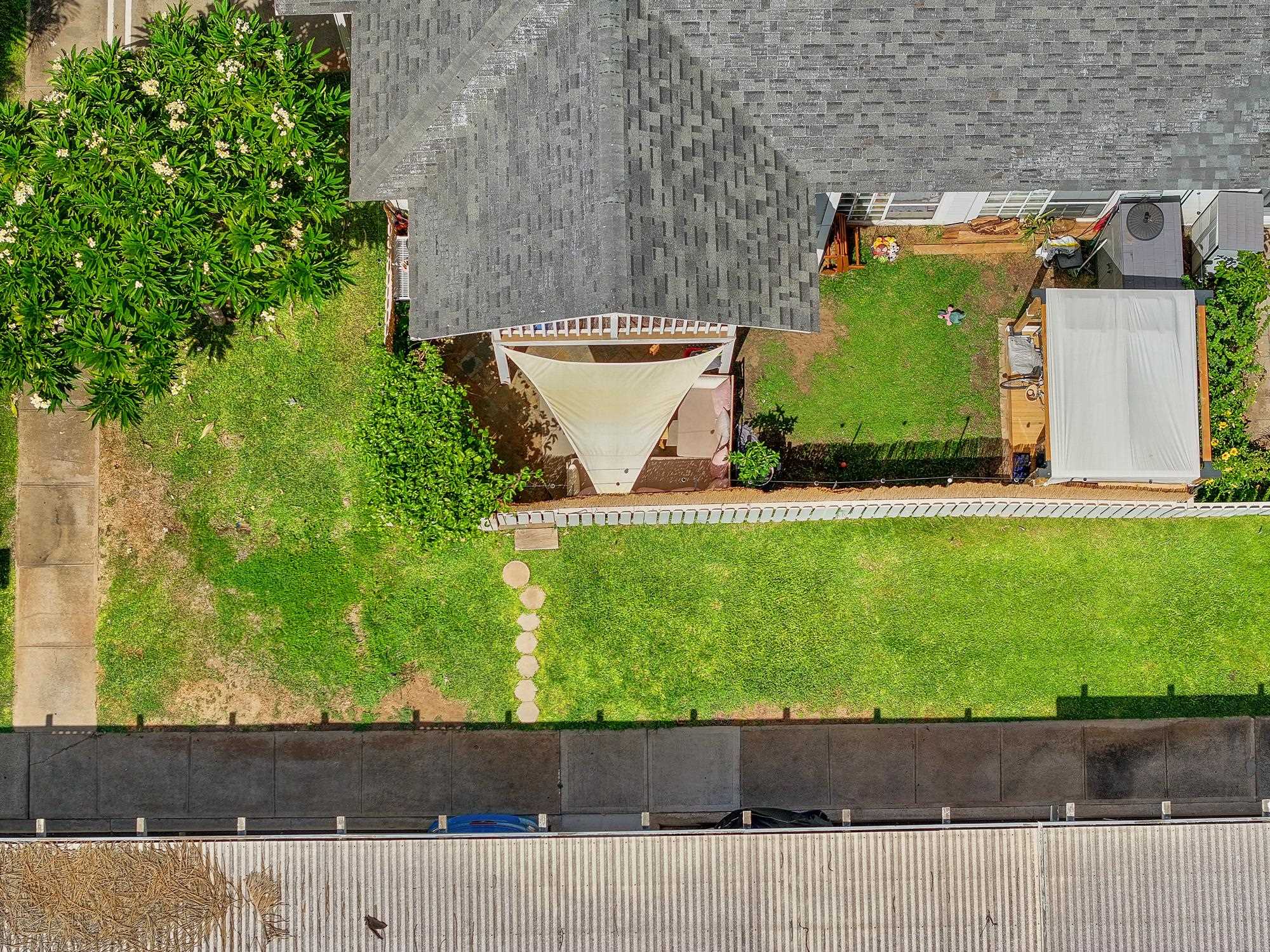 160 Keonekai Road, Unit 9101 Kihei, HI 96753 - Photo 22 of 23 view of a yard with potted plants