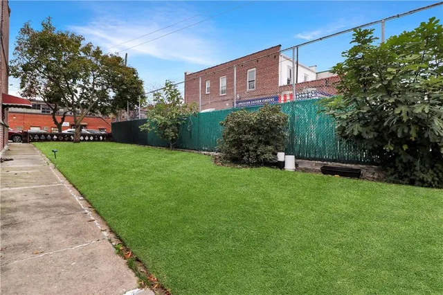 a view of a parking space in a city