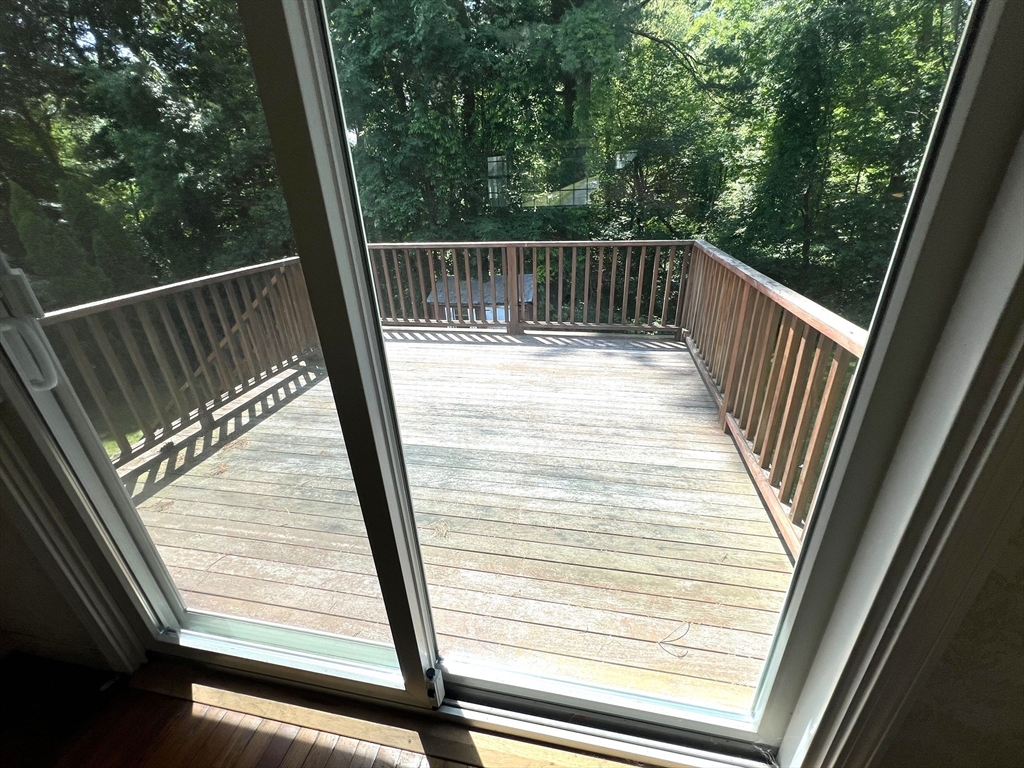 31 Dix Rd Extension Woburn, MA 01801 - Photo 5 of 22 a view of balcony with wooden floor