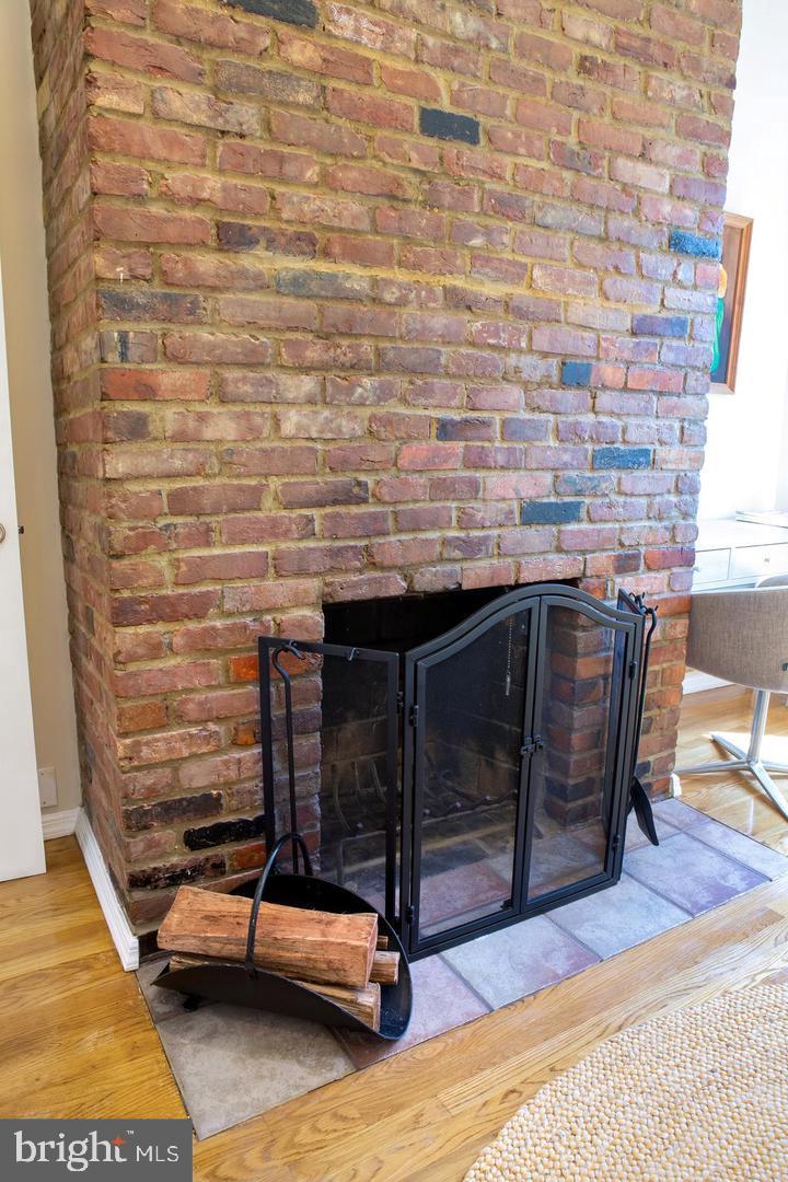 726 6th Street Northeast, Unit 1 Washington, DC 20002 - Photo 20 of 27 Charming brick fireplace centerpiece.