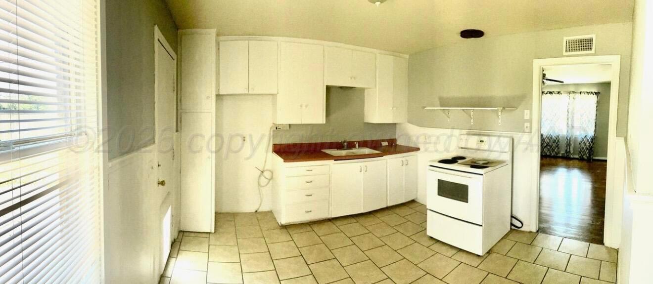 2212 Locust Street Amarillo, TX 79109 - Photo 3 of 10 IMG_3483