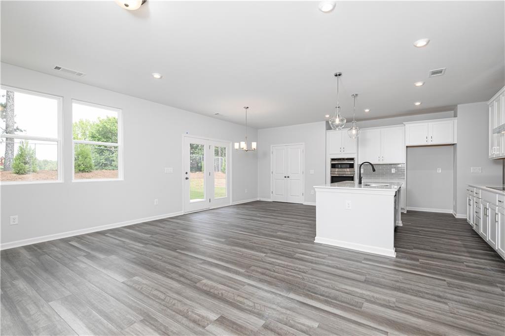 329 Cavalier Lane Acworth, GA 30102 - Photo 14 of 58 a view of kitchen with wooden floor