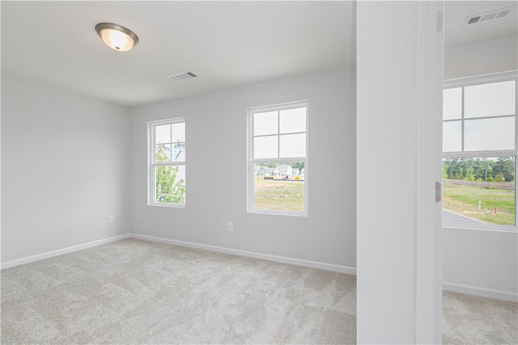 329 Cavalier Lane Acworth, GA 30102 - Photo 24 of 58 an empty room with windows