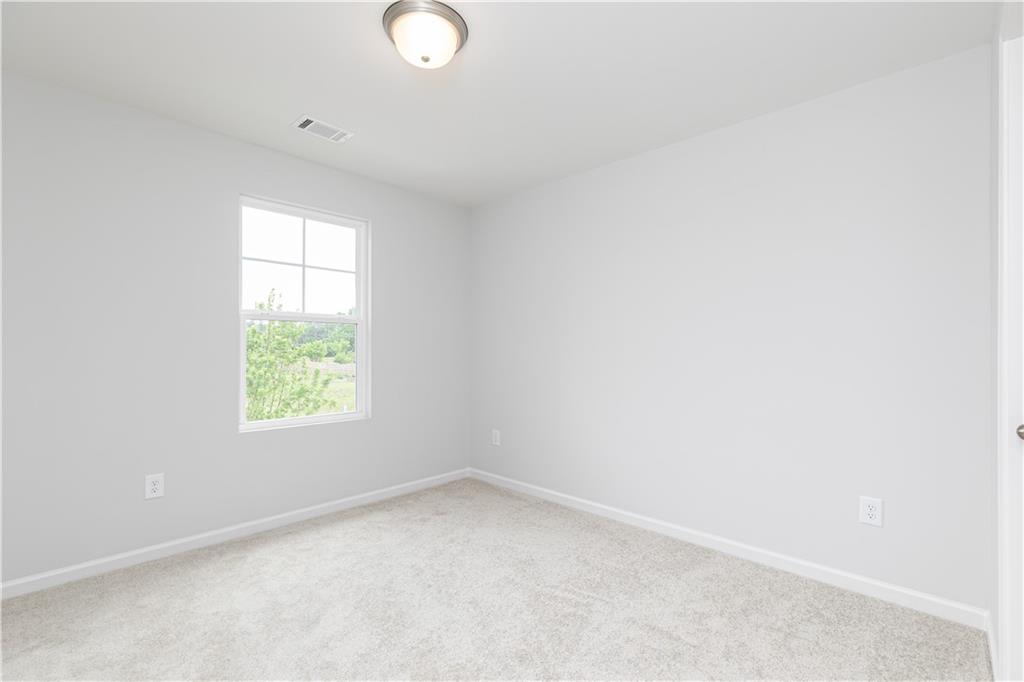 329 Cavalier Lane Acworth, GA 30102 - Photo 26 of 58 an empty room with a window