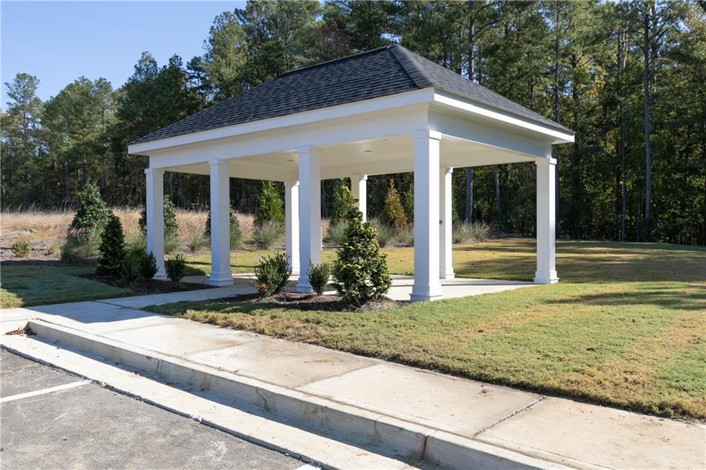 329 Cavalier Lane Acworth, GA 30102 - Photo 37 of 58 a front view of a house with garden
