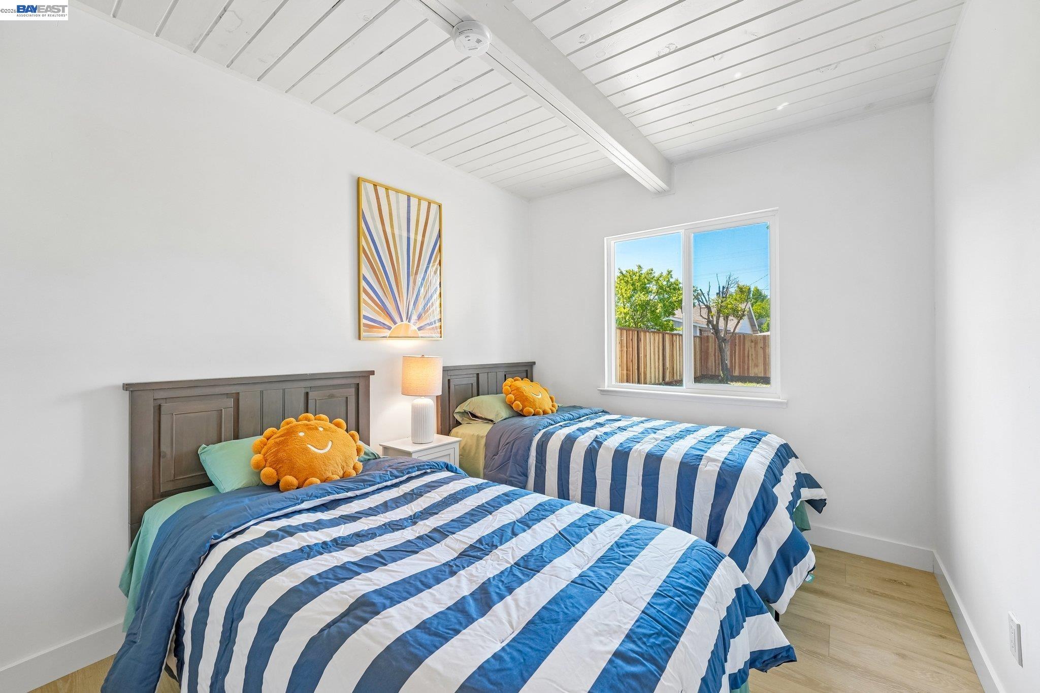 606 West 9th Street Santa Rosa, CA 95401 - Photo 34 of 52 a bedroom with two beds and a window