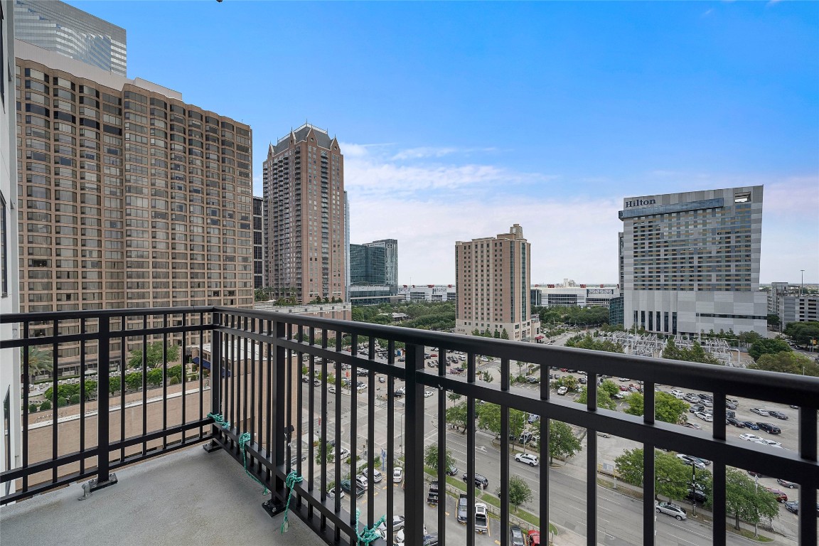 1211 Caroline Street, Unit 1102 Houston, TX 77002 - Photo 2 of 9 a city view from the balcony