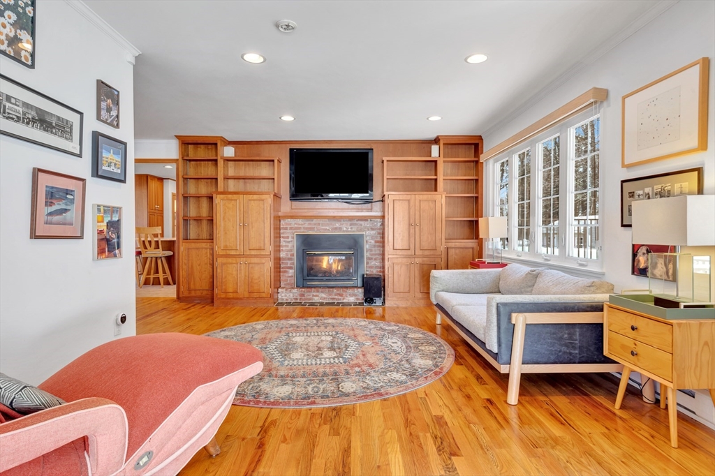 6 Blueberry Hill Road Groveland, MA 01834 - Photo 20 of 39 a living room with furniture fireplace and flat screen tv