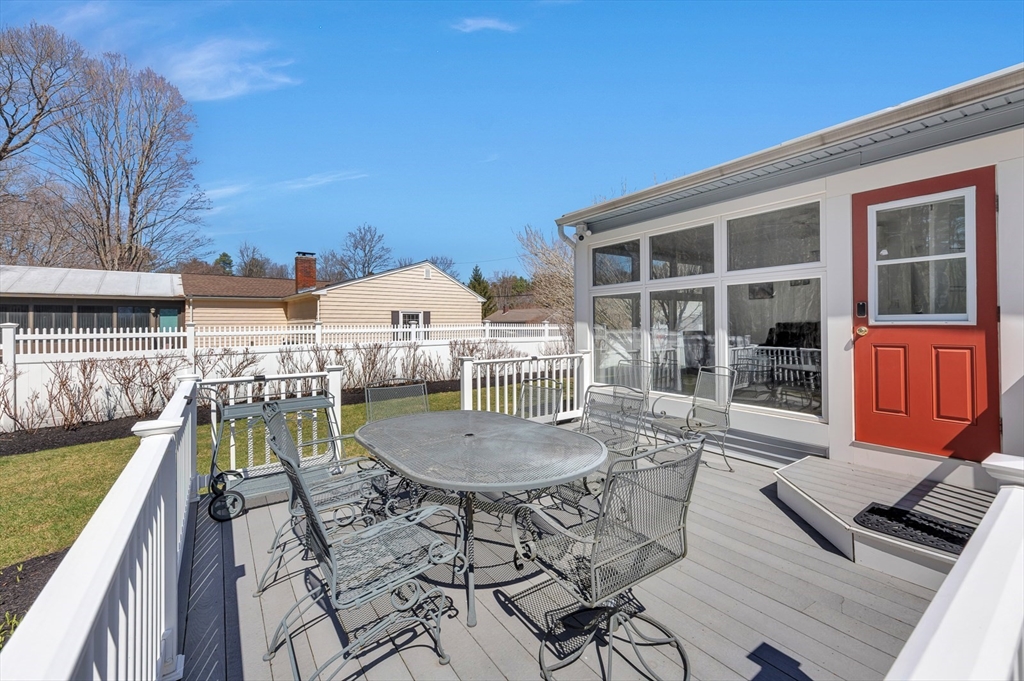 6 Blueberry Hill Road Groveland, MA 01834 - Photo 32 of 39 a view of a swimming pool with a lounge chair