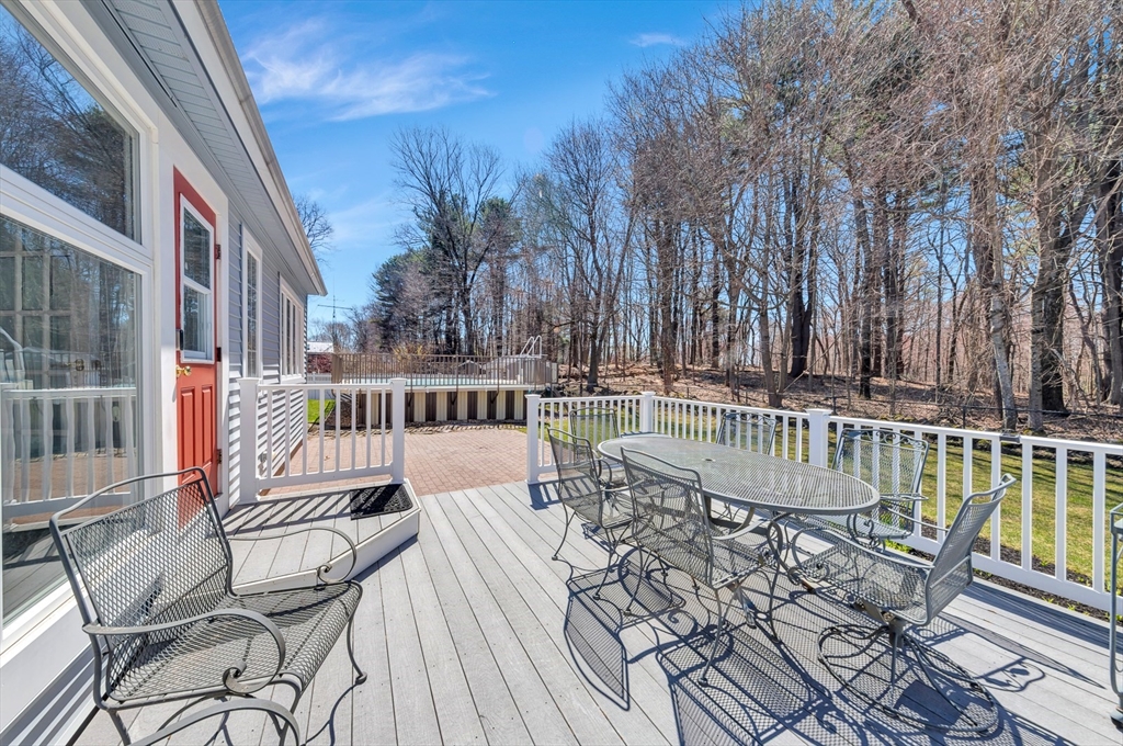 6 Blueberry Hill Road Groveland, MA 01834 - Photo 33 of 39 a view of balcony with wooden floor and outdoor seating